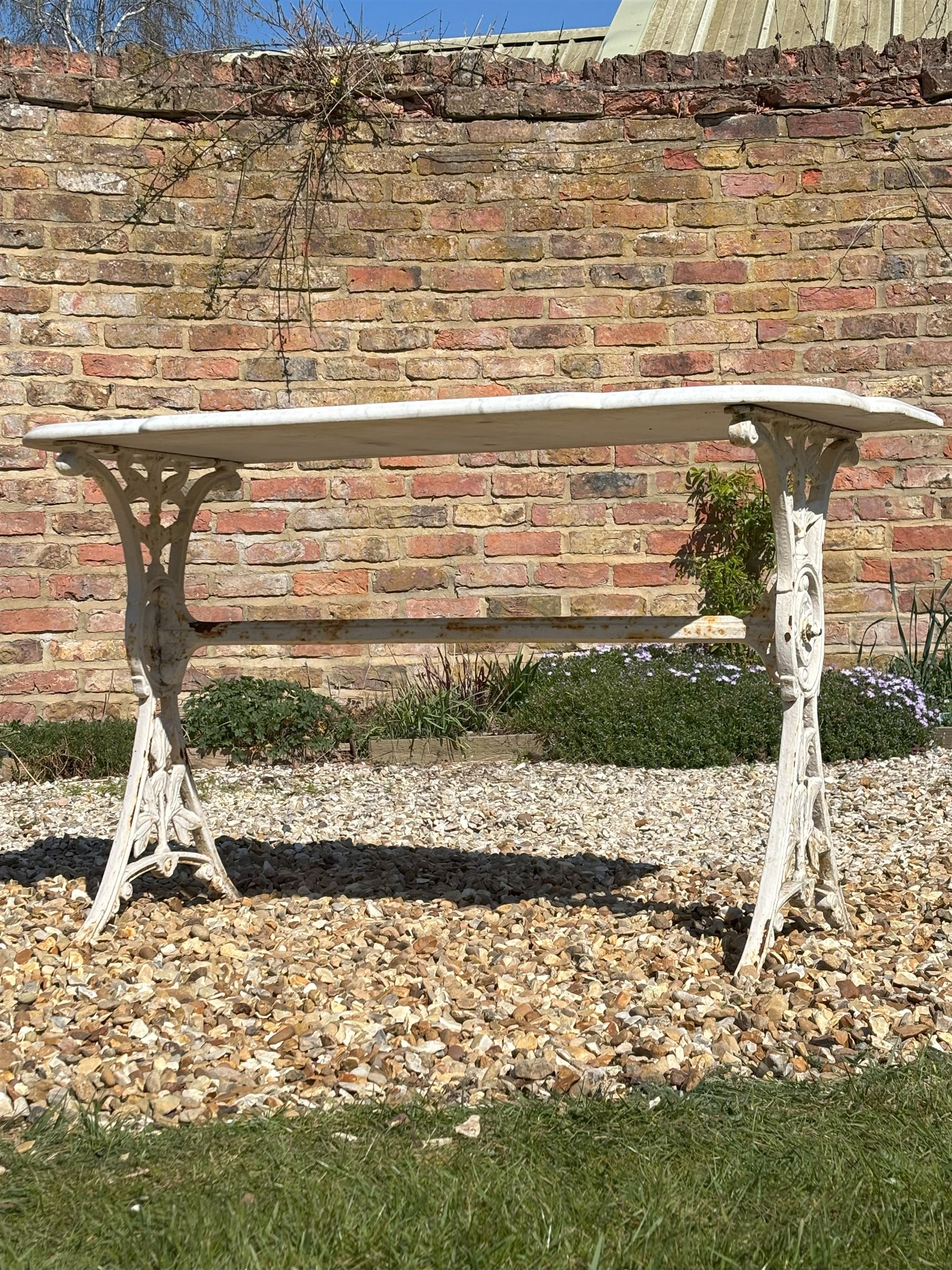 Victorian cast iron garden table by Coalbrookdale, with shaped white marble top on splayed end supports. H71cm, L123cm, D53cm. - COLLECTION BY APPOINTMENT FROM: The White House, Thirsk Road, Easingwold, York, YO61 3NF - CALL 01723 507111 TO ARRANGE