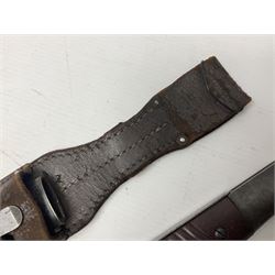 WWII German K98 Mauser bayonet by E. & F. Horster, the 24.5cm fullered blade marked 43aSW for 1943, numerous inspection marks to blade and pommel, bakelite grips and bluing to metal parts; in steel scabbard with corresponding numbers and leather frog L42cm overall