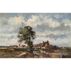 Ivan Taylor (British 1946-): Fields and Town Church, oil on canvas signed 49cm x 74cm 