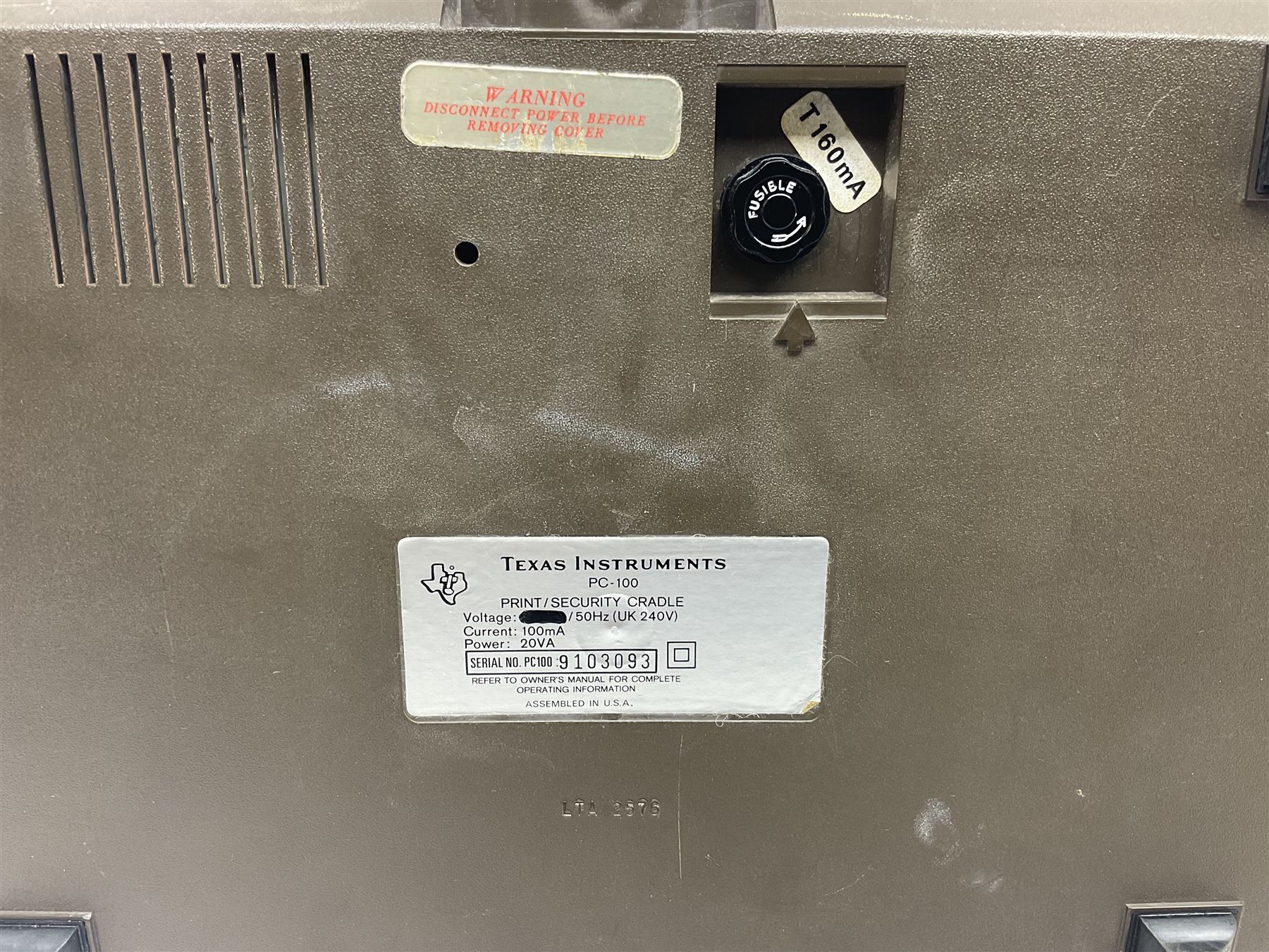 Four 1970s Sinclair electronic calculators - Cambridge in hard case with booklet; Scientific Programmable with Program Library and booklet; Scientific in hard case; and Oxford 300 in soft case with booklet; together with Texas PC-100 SR56 programmable slide-rule calculator on base station with readout, two booklets, keys and cover, serial no.9103093