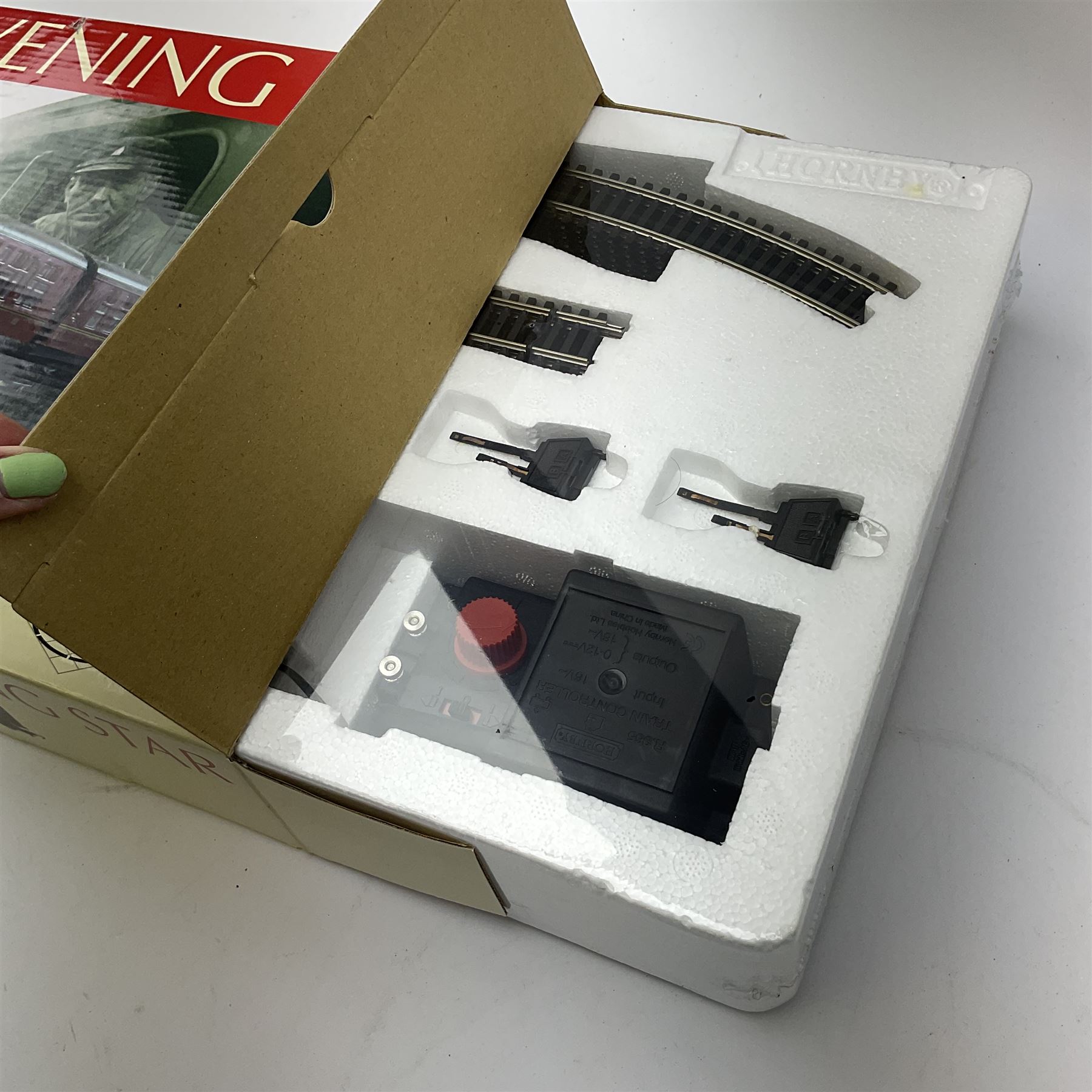 Hornby '00' gauge - Marks & Spencer Evening Star set with Class 9F 2-10-0 locomotive 'Evening Star' No.92220 and three coaches, mint and boxed with factory sealed inner packaging.