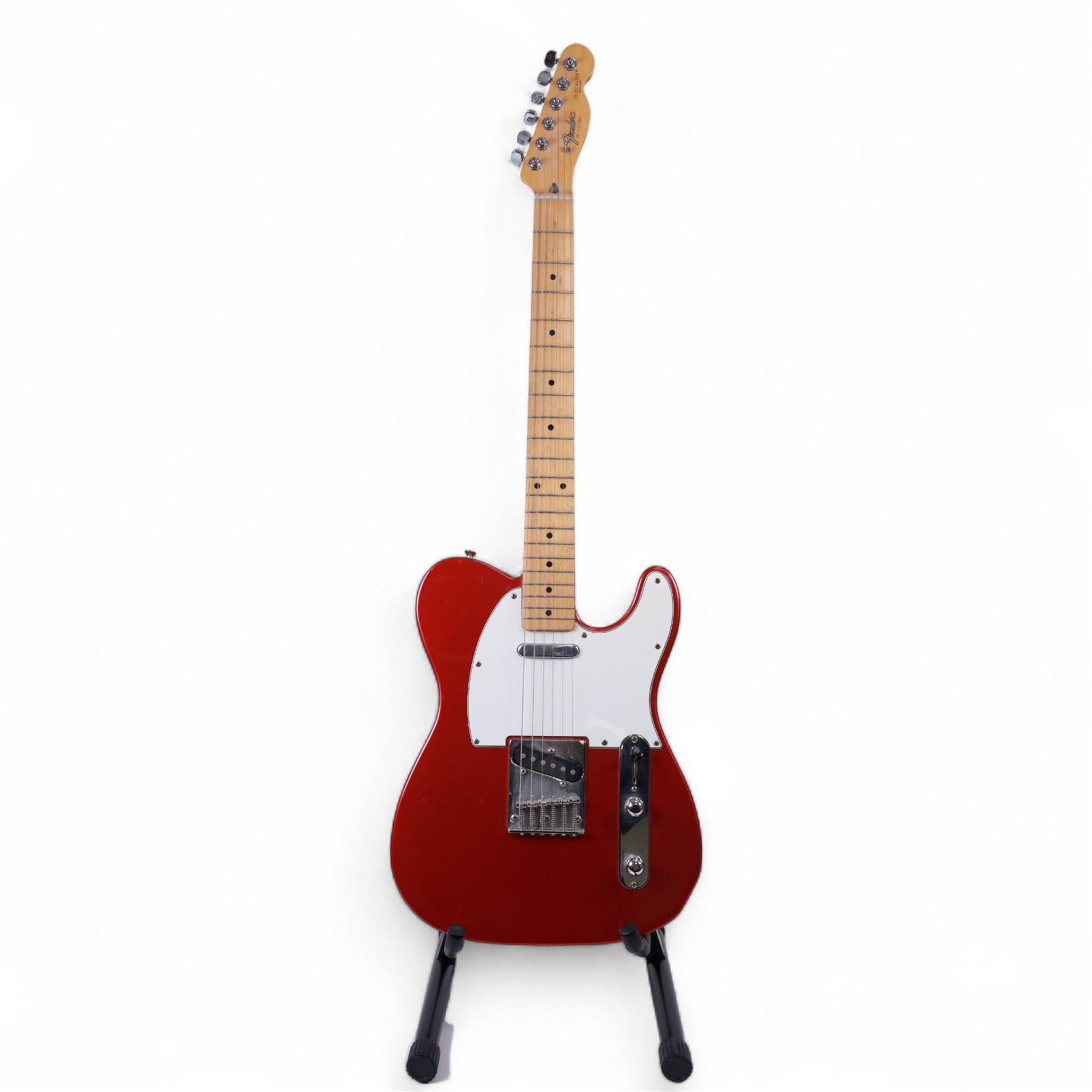 Fender Telecaster electric guitar, serial no. T021384 made in Japan c.1994, with Candy Apple Red body, white scratch plate and maple neck, guitar L98cm