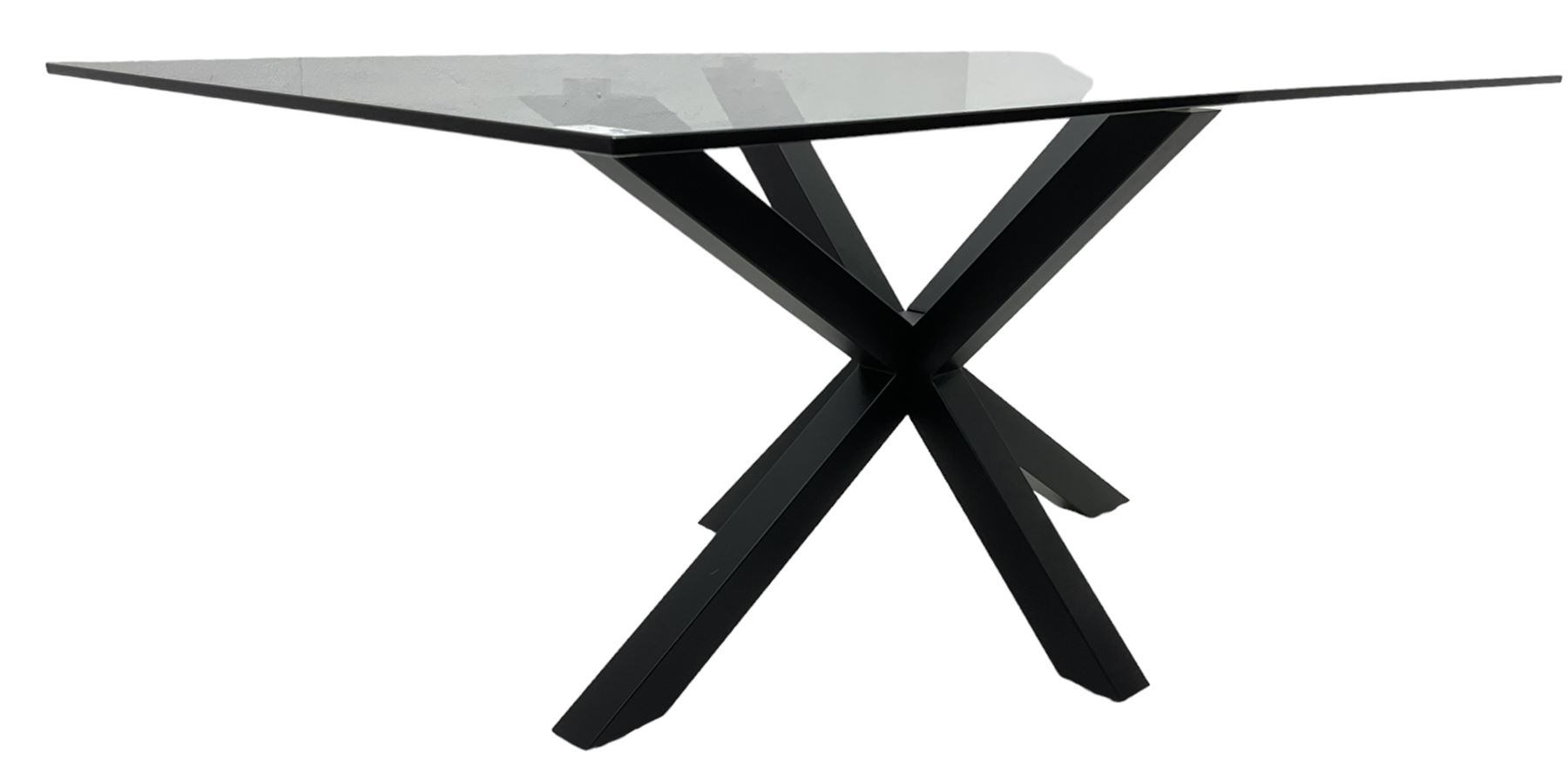 Contemporary glass and metal dining table, rectangular glass top on black finish steel X-framed base