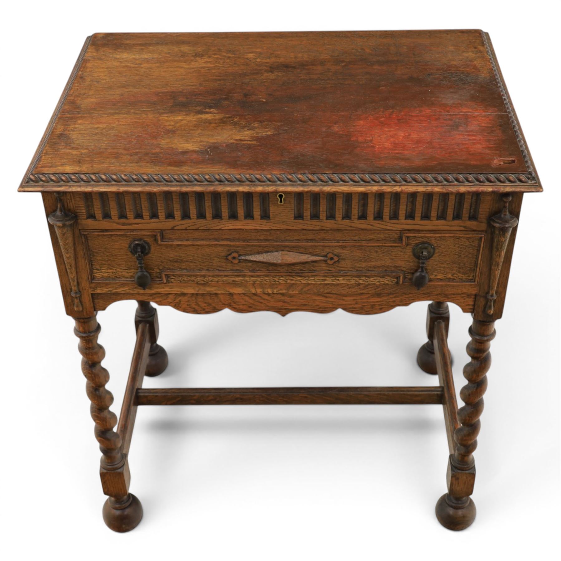Early 20th century oak cased canteen on barleytwist stand, hinged top with fitted baized lined interior, above a drawer fitted for cutlery