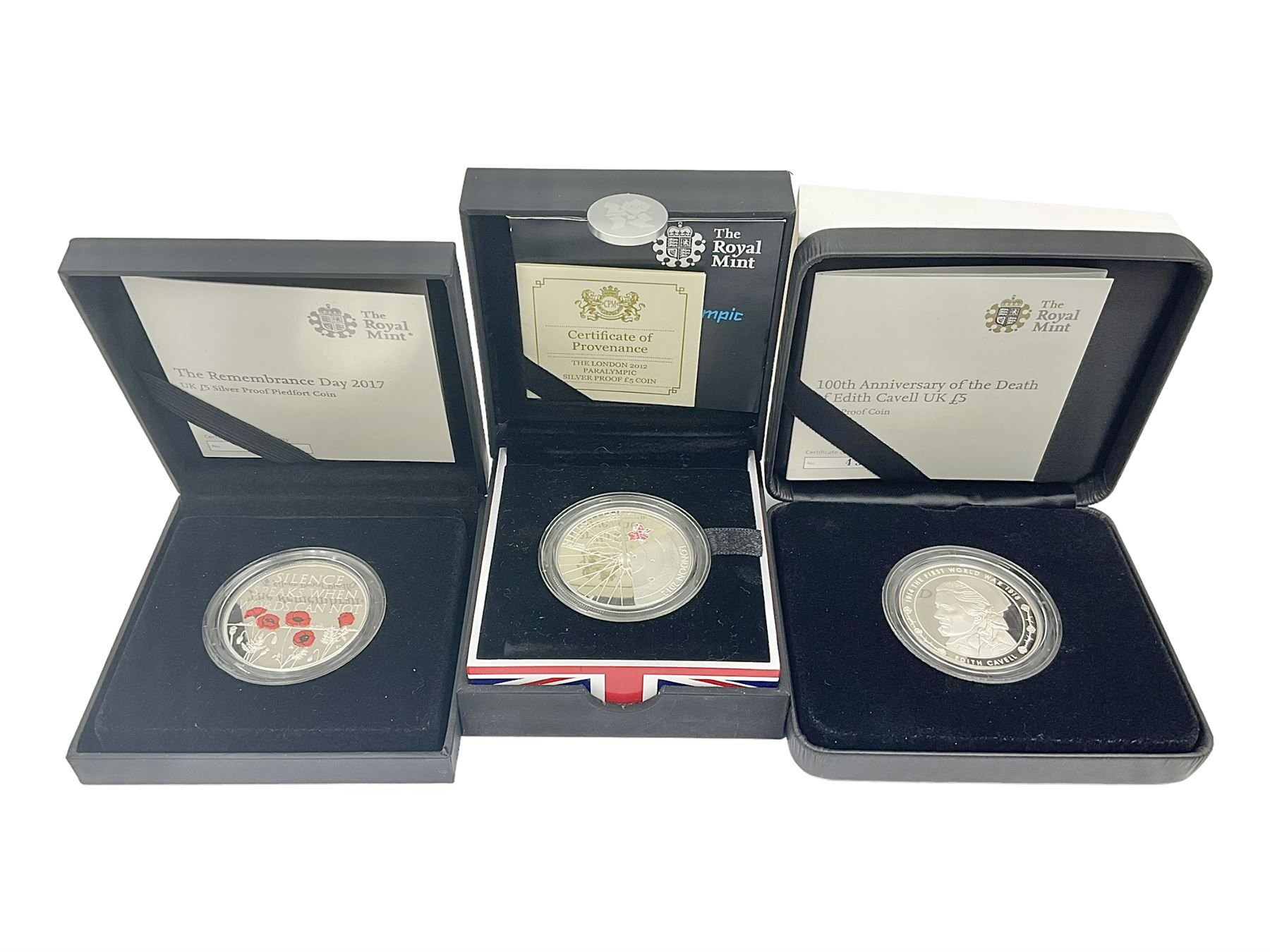 Three The Royal Mint United Kingdom silver proof five pound coins, comprising 2012 'London 2012 Paralympic', 2015 '100th Anniversary of the Death of Edith Cavell' and 2017 'Remembrance Day' piedfort, all cased with certificates 