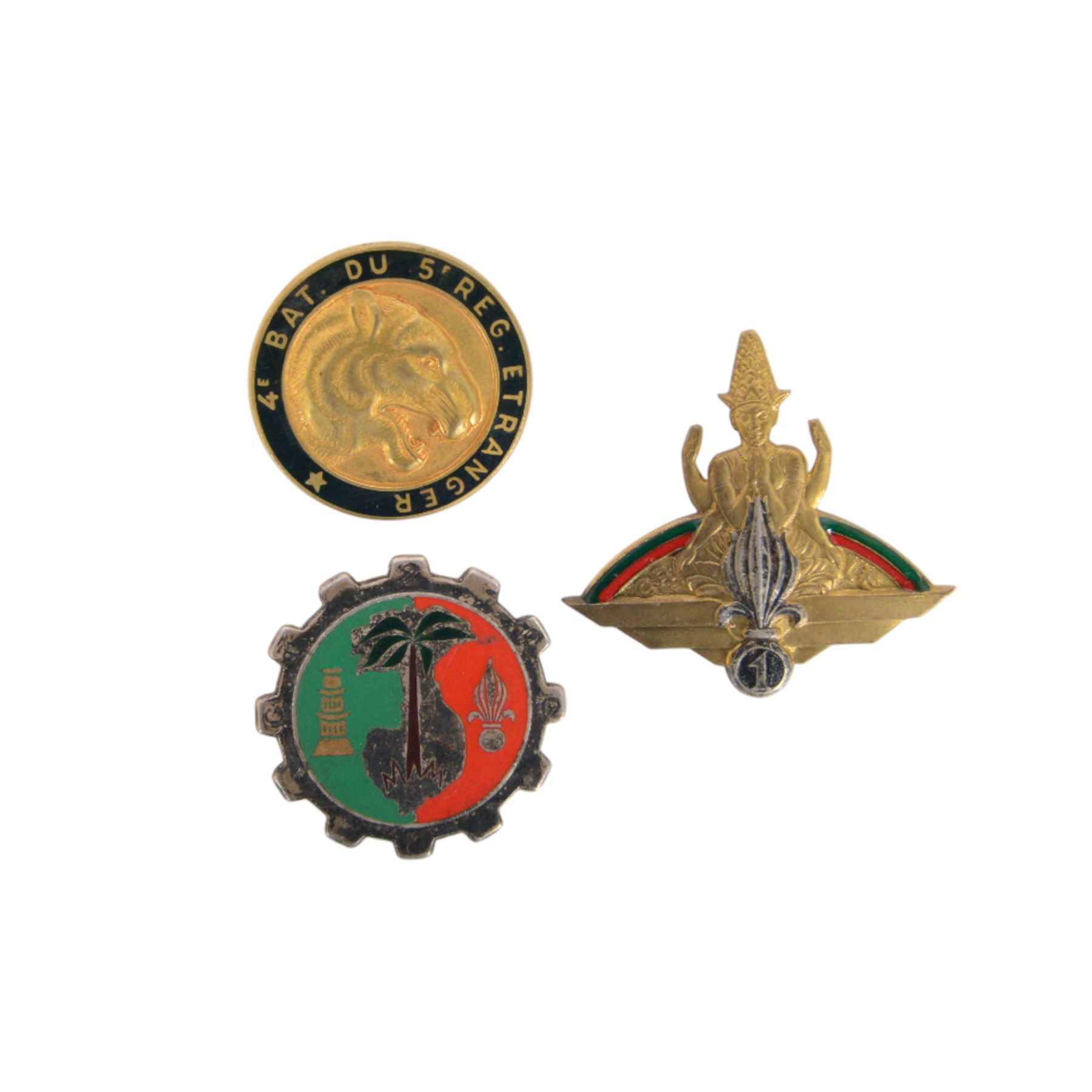 French Foreign Legion etrangere badges comprising seven  Kepi Blance Replacements and two Legion Cavalerie badges

