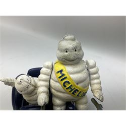 Cast iron figure of Michelin Man on motorbike modelled with smaller seated Michelin man in side car, H16cm