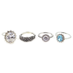  Four silver stone set rings, stamped 925  