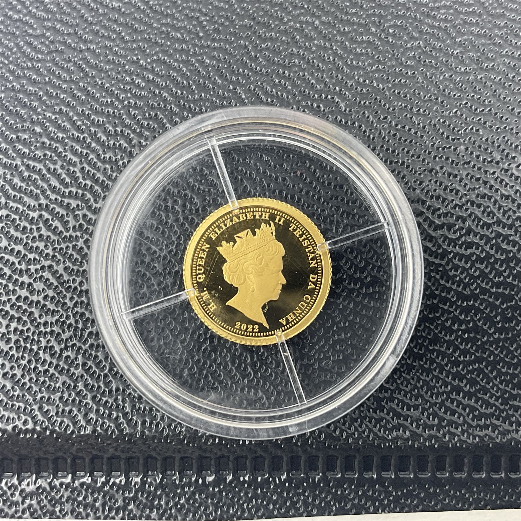 Eleven Queen Elizabeth II miniature gold coins, each being 0.5 grams of 24 carat gold, including Tristan da Cunha 2020 'Laurel', Solomon Islands 2020 '80th Anniversary of the Battle of Britain' etc, all with certificates