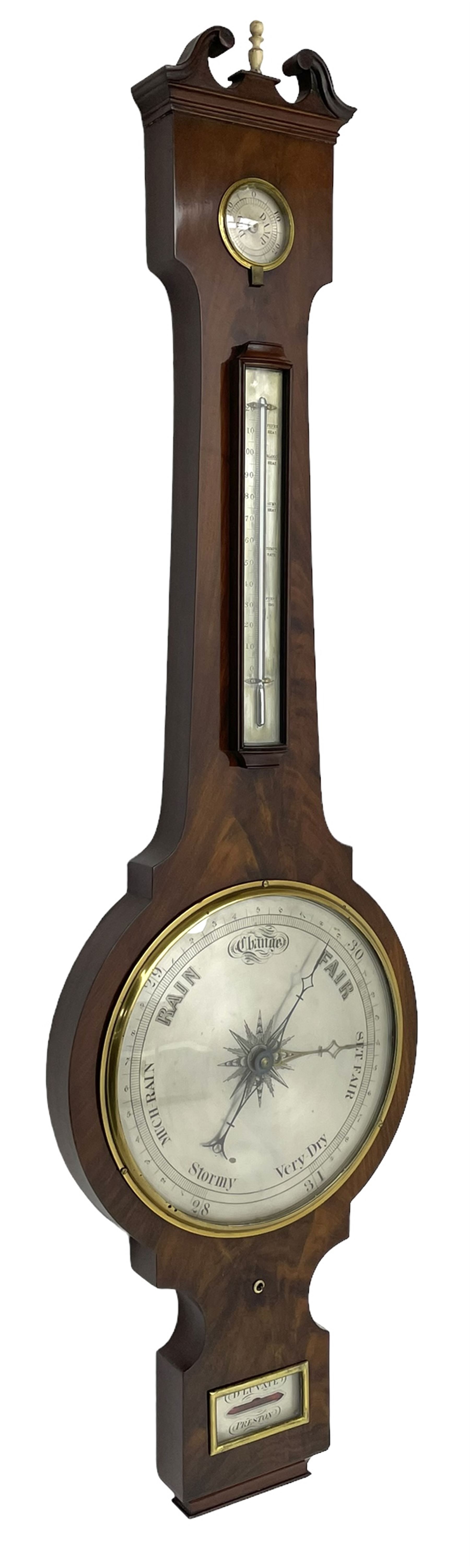 D Luvate of Preston - early Victorian mahogany mercury wheel barometer c1840, with a swan’s neck pediment and cavetto moulded square base, 8-inch silvered register calibrated in inches with a decorative star engraved centre, cast brass bezel and convex glass, with a steel indicating hand and brass recording hand, beneath a bowfronted Fahrenheit scale thermometer and hygrometer, rectangular spirit level signed D LUVATE, PRESTON.
Lacking recording hand button.
H109
Dominic Luvate is recorded as working as a barometer and looking glass maker in Friargate, Preston 1820-45
