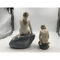 Two Royal Copenhagen figures, comprising The Little Mermaid, modelled by Edvard Eriksen, no. 4431 and Royal Copenhagen girl on stone no 4027, Little Mermaid H22cm