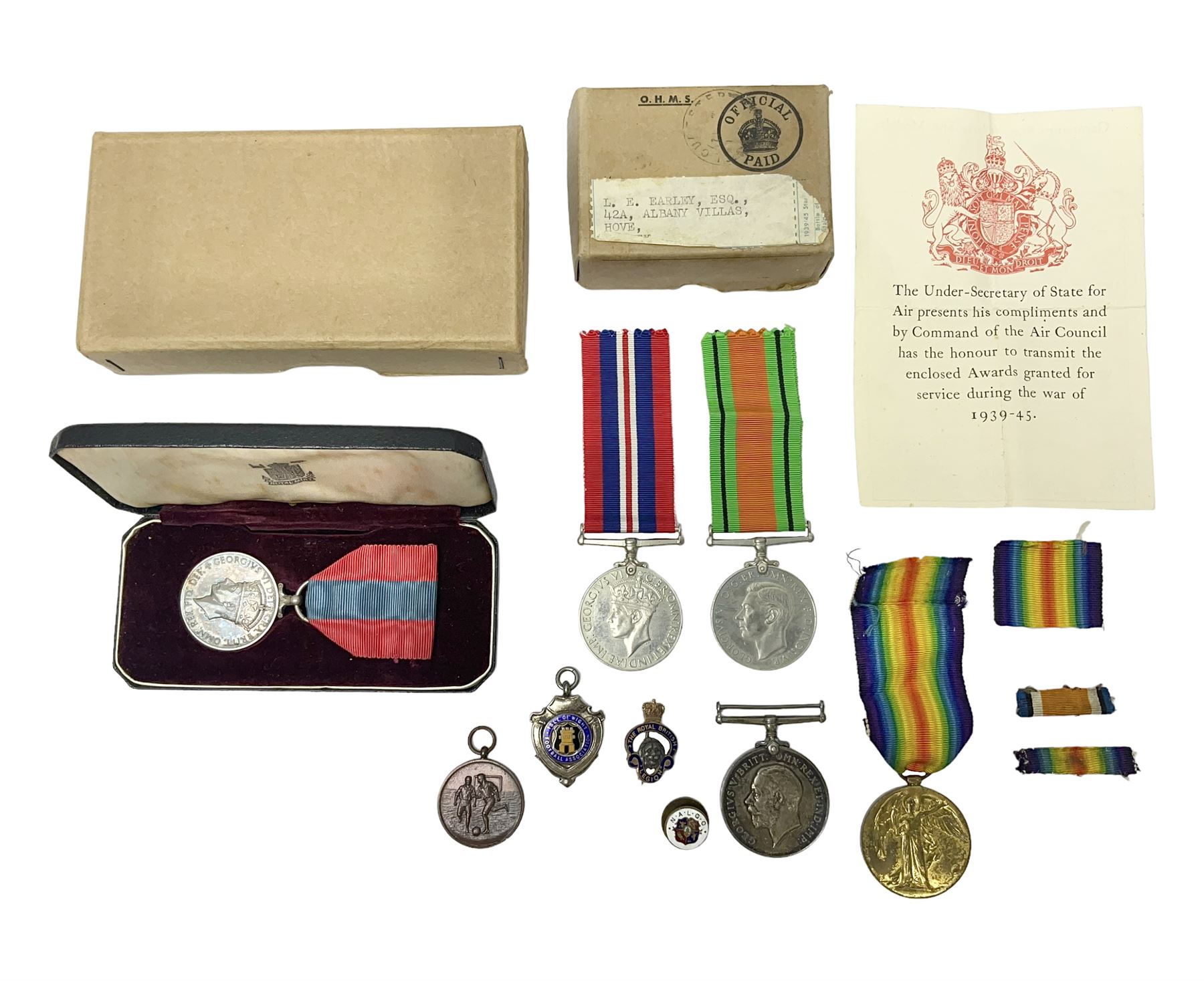 WWI pair of medals comprising British War Medal and Victory Medal awarded to 380807 Pte. W. Hayles Hamps. R.; Imperial Service Medal awarded to William Hayles; cased and boxed; WWII 1939-1945 War Medal and Defence Medal in issue box with slip; 1930s hallmarked silver football presentation fob etc