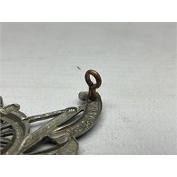 Third Middlesex Royal Garrison Artillery Volunteers Cap Badge, white meta Royal Artillery cap badge with “THIRD” to the top scroll and lower three part scroll “MIDDLESEX – R.G.A. – VOLUNTEERS”. Three lug fittings to the reverse.