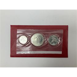 Four 'United States Bicentennial Silver Uncirculated Set 1776-1976', each consisting of quarter dollar, half dollar and one dollar coin, in blister packs and red envelope