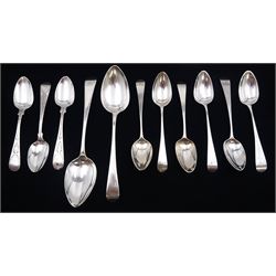Collection of George III silver Old English pattern spoons, comprising pair of dessert spoons, hallmarked William Eley II & William Fearn, London 1820, set of three teaspoons with bright cut decoration, hallmarked London 1812, maker's mark worn and indistinct, set of three teaspoons, hallmarked Thomas Oliphant and two over struck with maker's mark for Peter, Ann & William Bateman, London 1797 and 1804 and a set of three teaspoons, hallmarked Peter & William Bateman