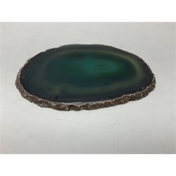 Pair of green agate slices, polished with rough edges raised upon silvered metal stands, H19cm