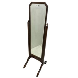 20th century mahogany framed cheval dressing mirror, rectangular bevelled plate with canted top corners, fluted uprights on splayed end supports and castors
