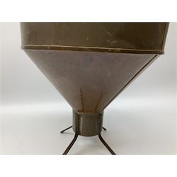 Agricultural copper corn funnel, H32.5cm, another similar copper funnel and copper warming platter of oval form, with twin handles on four supports, with removeable warming plate, L49cm
