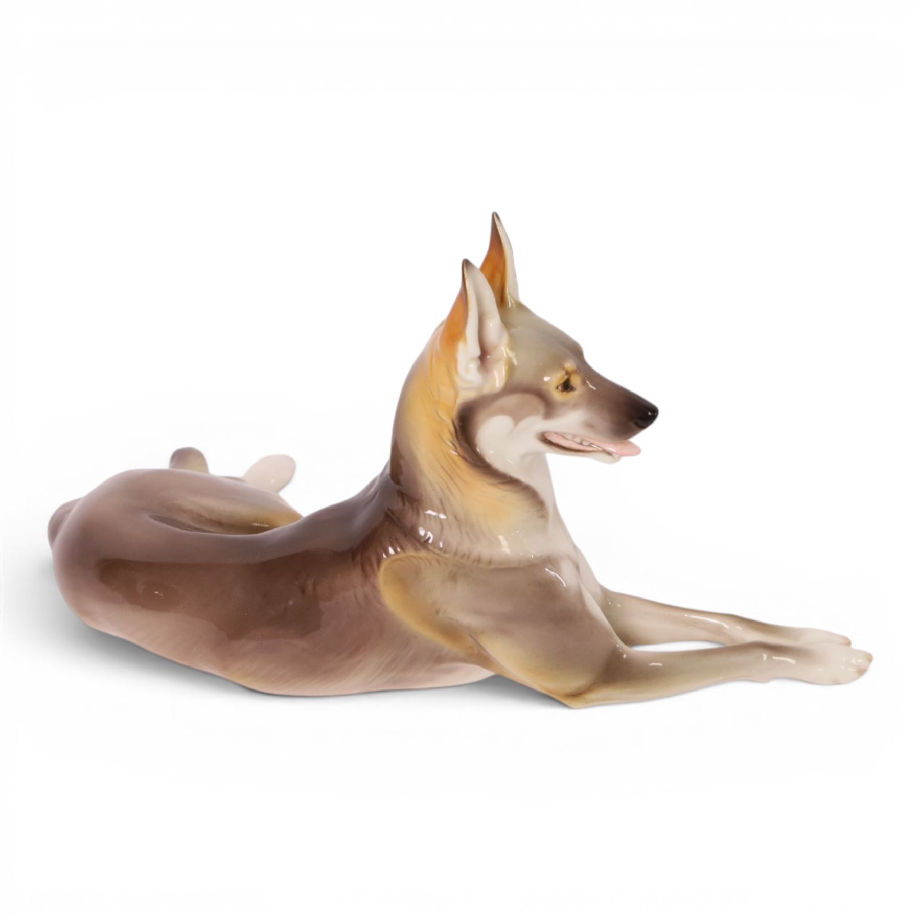 Nymphenburg German Shepherd by Theodor Karner, printed mark and impressed marks beneath, H14cm 