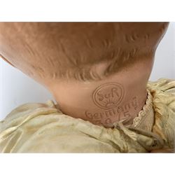 Seyfarth & Reinhardt composition head baby doll with moulded hair, sleeping flirty eyes, open mouth with one tooth and tongue and soft body with composition jointed limbs, marked 'SuR Germany 30/5' H47cm; together with a Golborne Dolls 'Golborne Beauty' composition head and body bride doll, marked 'F.P.23' in original box H63cm (2)