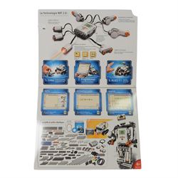 Two Lego Mindstorms sets, comprising 8547 NXT 2.0 and 31313 EV3, both partially built with boxes and instructions