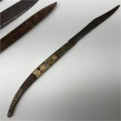 19th century continental folding knife with 15.5cm single edged blade, the pierced brass and iron handle with remains of horn grips L21.5cm overall closed; turned horn handled knife with foliate engraved blade; battlefield relic German 1884/98 knife bayonet; iron spear head; leather covered swagger stick; and two-piece gun cleaning rod
