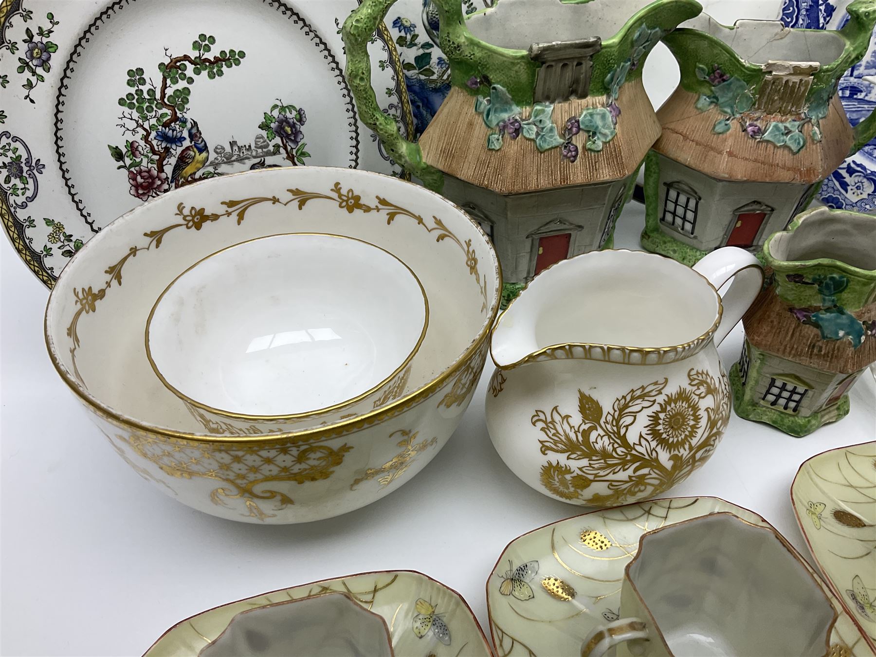 Royal Crown Derby Brocade pattern jug and sugar bowl, together with a similar gilt floral pattern bowl, three graduating Staffordshire style pearlware cottage jugs, Leeds Pottery model cottage and other ceramics and glassware, etc