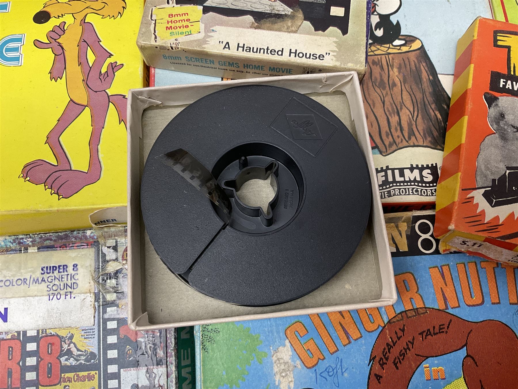 Corgi/Disney - Movie Vision, in original box, with Corgi projector, two Corgi Movie Viewers and nine films; together with 8mm film reels and strips to include Disney’s Dumbo, Mickey Mouse, Alice in Wonderland etc, most in original boxes