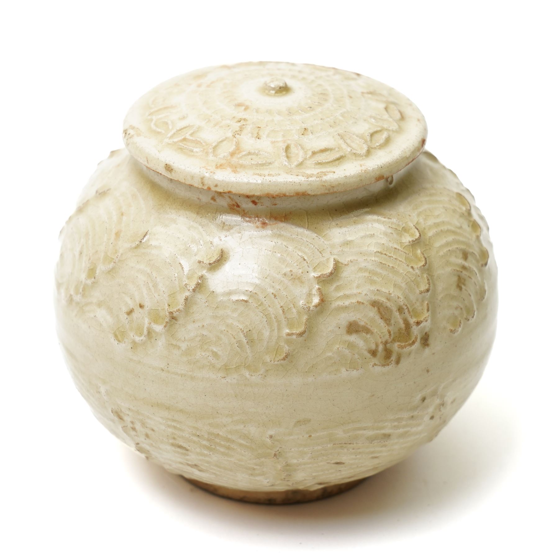 Chinese celadon glazed jar, possibly Ming dynasty, with moulded repeating decoration, 9.5cm