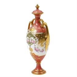 Early 20th century Royal Crown Derby vase and cover, of slender form, the pompadour pink ground with gilt decoration, painted centrally with a tree, printed marks to base, H25cm 
