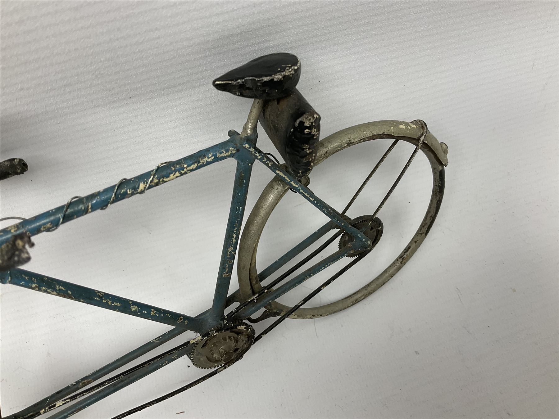 Chad Valley clockwork Fordson Major Tractor, a group of play worn Britains and other lead and metal farm animals, figures and accessories including a kennel, haystacks, dovecote, cows, sheep etc, together with a diecast model of a Tandem Bike L31cm