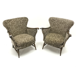  Pair Parker Knoll armchairs, upholstered in a patterned beige fabric, turned supports joined by stretchers, W79cm  