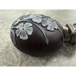 Victorian Thomas Webb silver mounted cameo glass scent bottle, hallmarked Sampson Mordan and Co, London 1884, the cameo glass body of circular form, decorated with white flowers and foliage in high relief upon a black ground, the hinged cover opening to reveal the original stopper, H6cm 