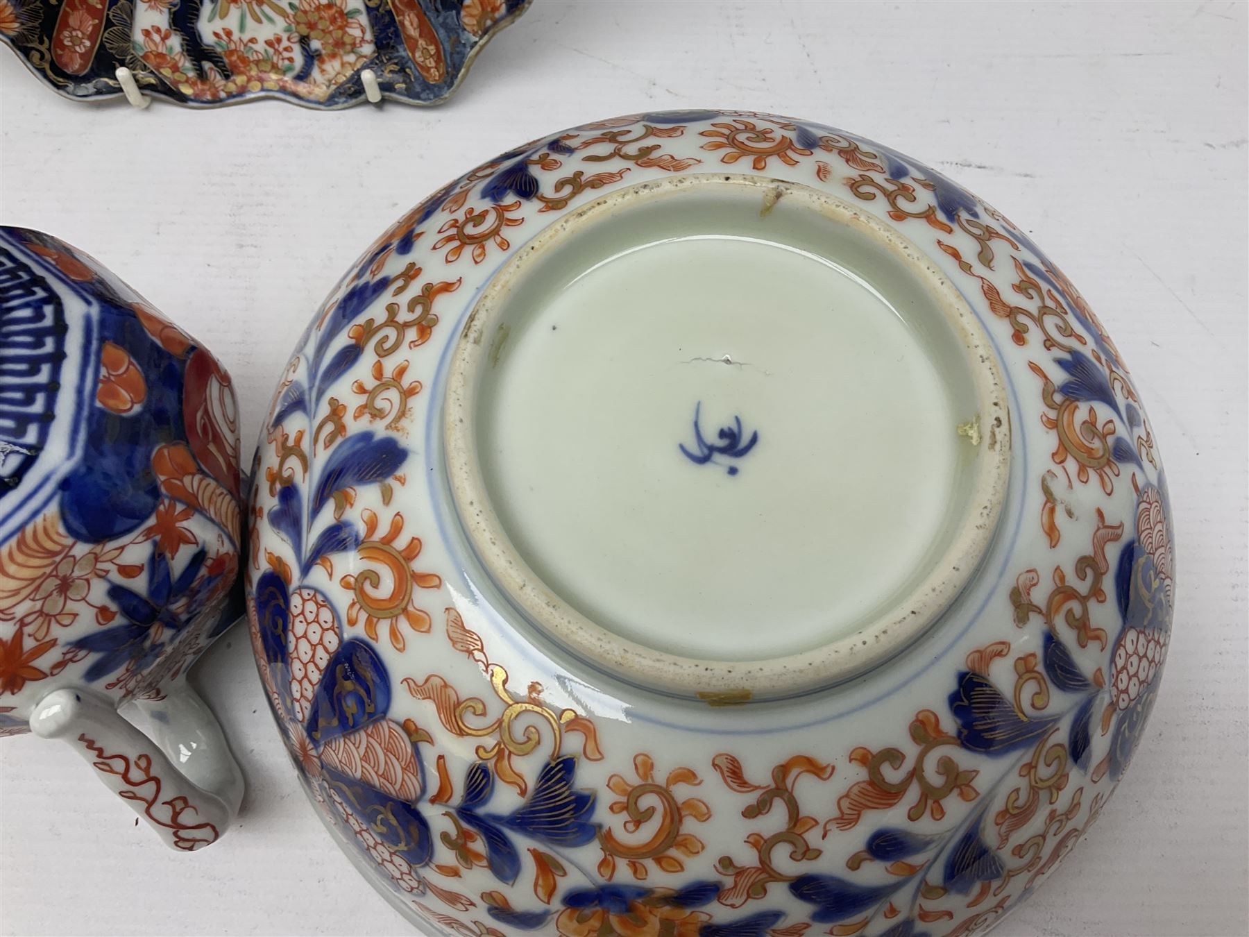 Two Japanese Imari bowls, together with Imari dish with scalloped edge and jug, largest bowl, H12cm