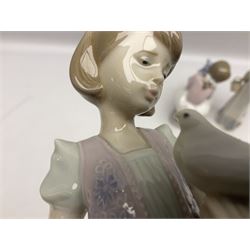 Three Lladro figures, comprising Garden Classic, signed no 7617, Summer Stroll no 7611 and Best Friend no 7620, all with original boxes, largest example H24cm 