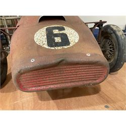 Tri-ang pressed steel Grand Prix Vanwall child’s pedal racing car, English 1960s, finished in red with racing No.3, original white plastic steering wheel, metal bucket seat, bonnet air intake, chrome plated side exhaust, chrome spoked wheels with chrome plated spinners, black solid rubber tyres L121cm W53cm H46cm)