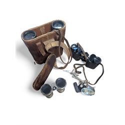 Three pairs of binoculars including Wrayvu 8x30 and Busch Hellux, together with a tabletop...