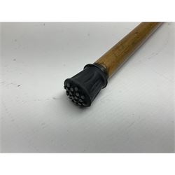 Malacca walking cane, with domed Burmese silver pommel embossed with deities, L91.5cm