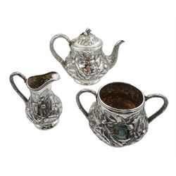 Victorian silver three piece silver tea service, embossed and engraved stylised leaf decoration, the cartouche with engraved initial 'ED', by Robert Harper, London 1868, approx 49oz