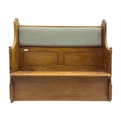 Early 20th century waxed pine pew, inset upholstered striped back panel with hinged box seat enclosing storage, shaped arms and turned supports