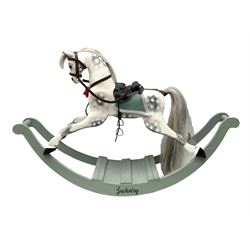 'Zachary' - small painted wooden rocking horse, the dappled pony with mane, tail, simulated leather saddle and stirrups L90cm H59cm