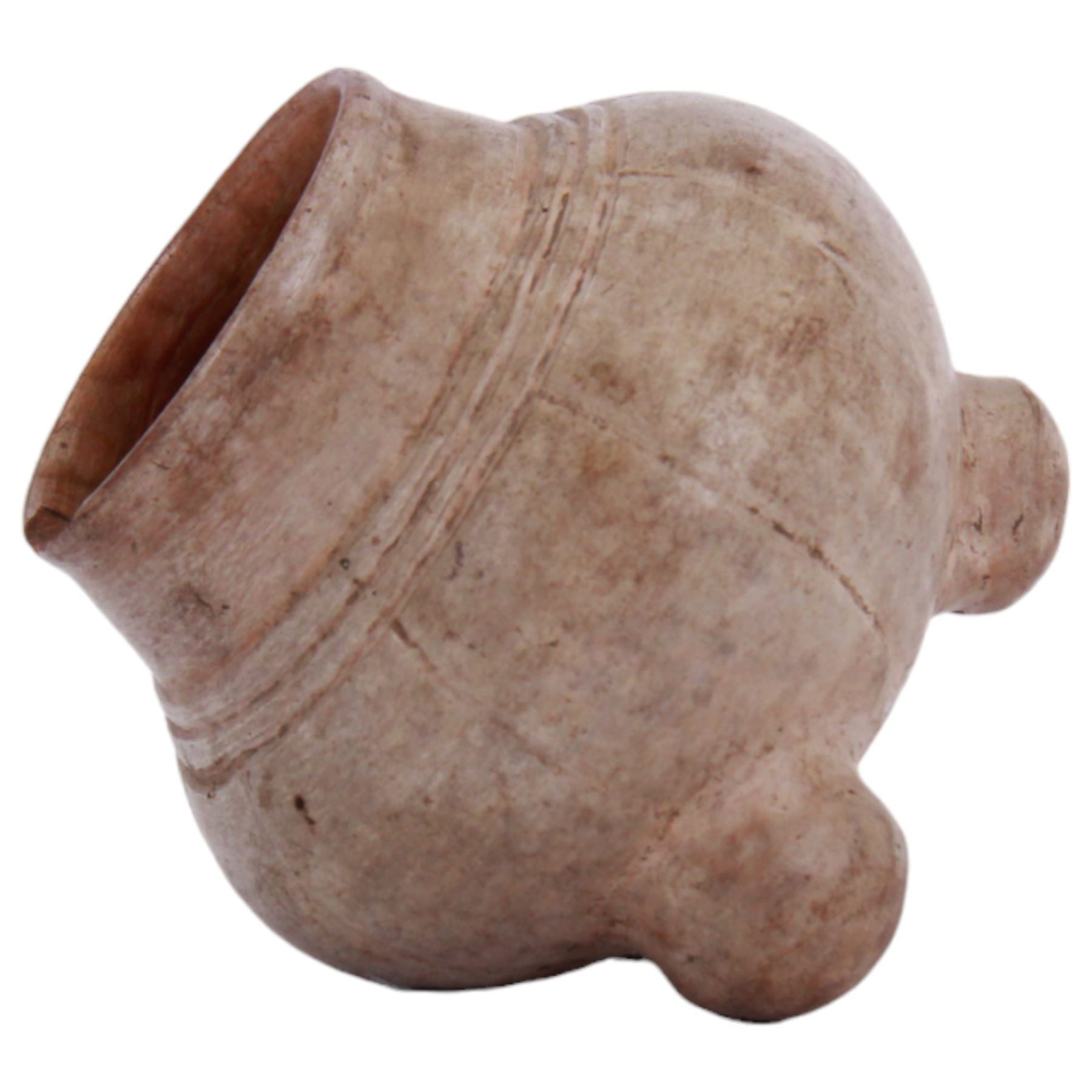 Maya pottery tetrapod bowl or jar, the cream glazed body of part ribbed bulbous form with short neck, upon three short feet, H10cm

With accompanying collectors note detailed 'Maya musical bowl, exceedingly rare cream glaze. Pre-Classic period Circa 400 AD.'