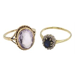 Gold sapphire and diamond chip cluster ring and a single stone oval amethyst ring, both 9ct stamped or hallmarked 