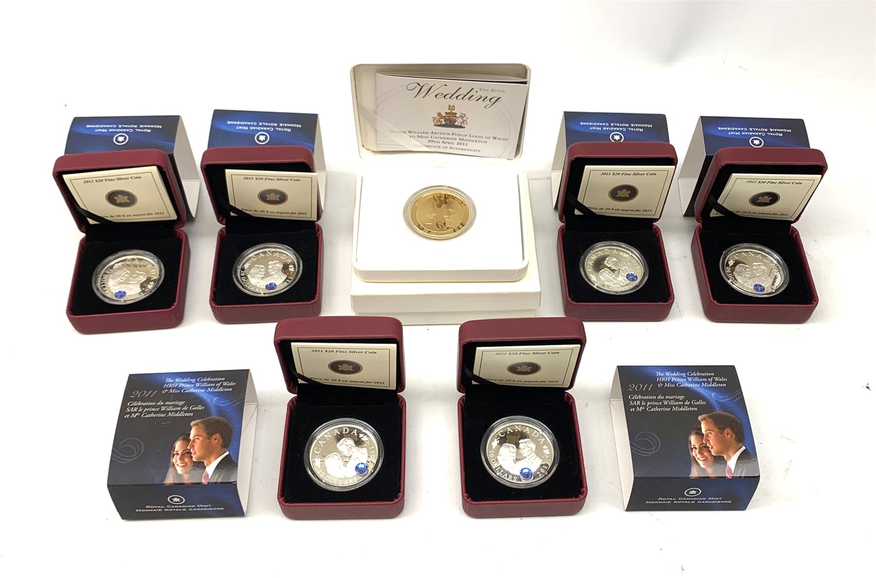 Six Royal Canadian Mint twenty dollar fine silver coins, all 2011 commemorating 'The Wedding Celebration HRH Prince William of Wales & Miss Catherine Middleton' and a Royal Mint 'The Royal Wedding' 2011 gold plated sterling silver five pound coin (7)