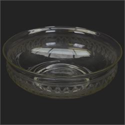 Edwardian glass wash jug and bowl, each engraved with looping border, jug H31.5cm, bowl D39.5cm