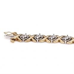 14ct white and yellow gold diamond fancy link bracelet, set with thirty-eight round brilliant cut diamonds, stamped, total diamond weight approx 1.15 carat