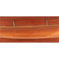 20th century mahogany and pine half-block hull model of a two masted ship, H28cm, W110cm
