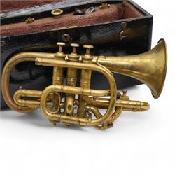 Early 20th Century brass cornet by R. De Lacy of 84 Holland Road, Brixton, London and Paris, in original ebonised case
