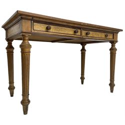 19th century walnut side table, rectangular top over two drawers with elm facias, lobe carved handles and moulded edge in mahogany, on turned and fluted supports 