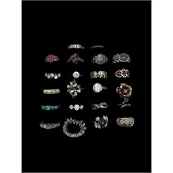 Twenty-two silver and stone set silver rings including turquoise, garnet, cubic zirconia, moonstone, topaz, tanzanite and amethyst, stamped 925
